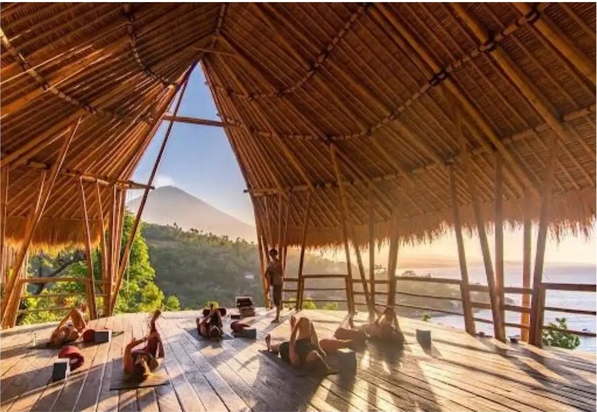 Bamboo yoga shala with an open view of the Bali landscape