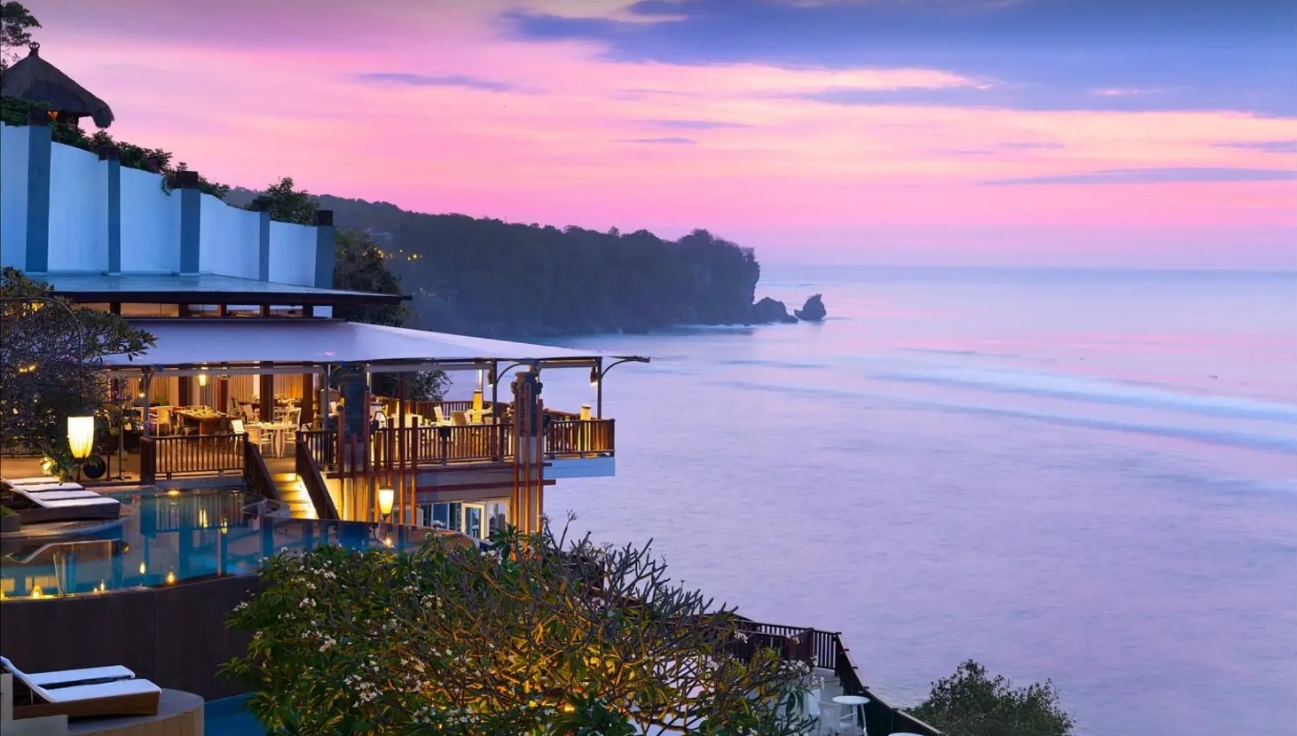 Ocean and cliffside scenery in Uluwatu, Bali, at sunset